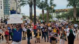 Hundreds rally outside Orlando City Hall Thursday, Aug. 11, 2023, to protest Gov. Ron DeSantis' suspension of democratically elected Monique Worrell, the former Orange and Osceola counties state attorney. 