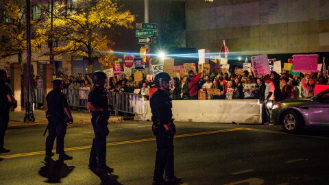As President Trump took center stage in Syracuse's OnCenter, hundreds of protestors were met with a police barricade outside the venue.