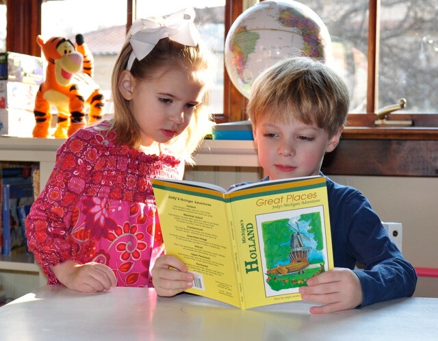 Trey and Sophie read Holland.