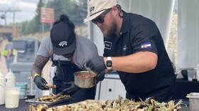 Chefs from Breckenridge Distillery prepare “summer corn uchepos” — a dish that’s similar to a tamale but made with fresh corn instead of corn flour — at the Heritage Fire food festival in Snowmass Village on July 29. The bites earned Chef Robbie Reyes the title of “Heritage Hero” in a competition at the festival.