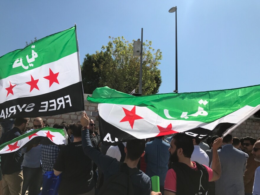 Mourners join the funeral procession for the Barakats on Saturday. Orouba was a member of the Syrian National Coalition, a political opposition group.