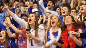  Fans celebrate as the last seconds tick off the big screen in Allen Fieldhouse on Monday night.