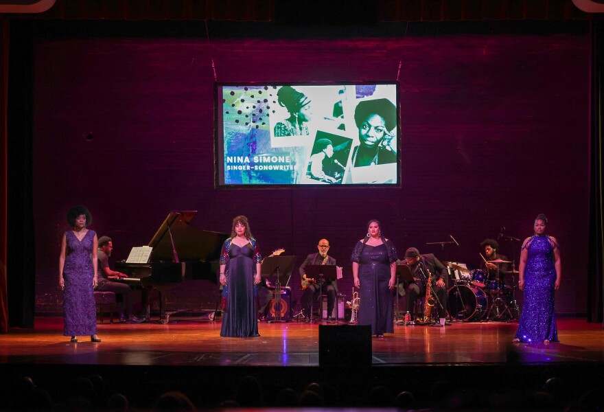 Karolyn Lee Gholston, Keyona Willis, Destiny Coleman and DeMeeshia Marshall standing onstage performing in Coleman's 'The Journey: Civil Rights'