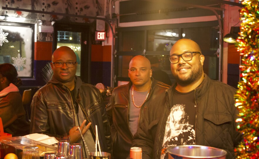 From the left: Killa Hill's Gerald Barclay and Herman Dawson, posing alongside Chris Everett at the opening night afterparty, hosted at Eagle's Dare in Wilmington.