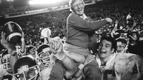 FILE - Arkansas coach Lou Holtz is carried by his players after defeating Oklahoma in the Orange Bowl NCAA college football game, Jan. 2, 1978, in Miami, Fla. (AP Photo/Phil Sandlin, File)