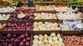 Onion and garlic produce at a grocery store in Fairfax, Virginia, on March 3, 2011. USDA Photo by Lance Cheung.