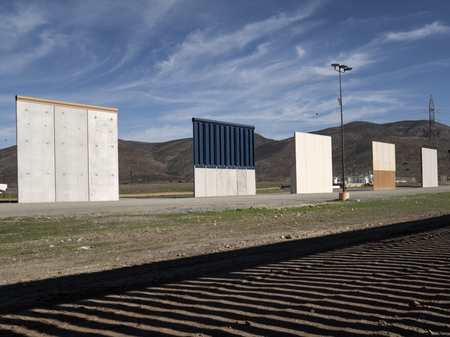 Border wall prototypes stand in San Diego near the U.S.-Mexico border. The federal government remains partially closed in a protracted standoff over President Trump's demand for money to build the wall.