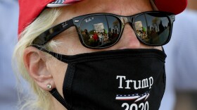 A person protests against the passage of a mail-in voting bill during a Nevada Republican Party demonstration at the Grant Sawyer State Office Building on August 4, 2020 in Las Vegas, Nevada. (Ethan Miller/Getty Images)