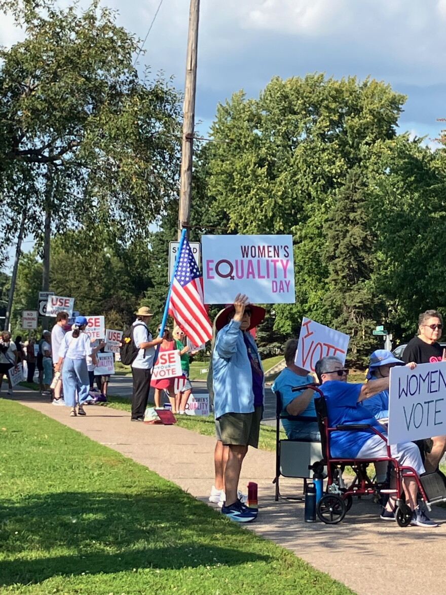 Wednesday's protest at Davenport's Vander Veer Park was organized by the QC chapter of National Organization for Women and Progressive Action for the Common Good.