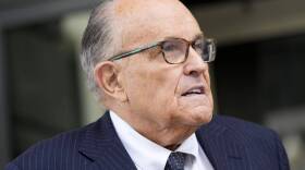 Rudy Giuliani speaks with reporters as he departs the federal courthouse. (Patrick Semansky/AP)