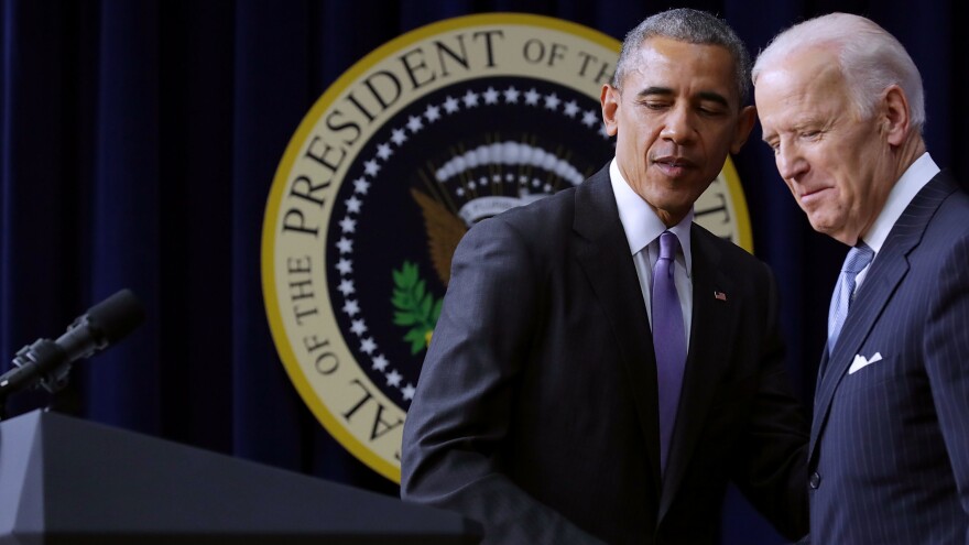 President Obama and then-Vice President Joe Biden appear at a bill signing in Dec. 2016. Late in his term, Obama was using executive actions to advance much of his agenda in the face of congressional opposition. President Trump was unapologetic about taking such actions, which some Democrats think should be Biden's approach.