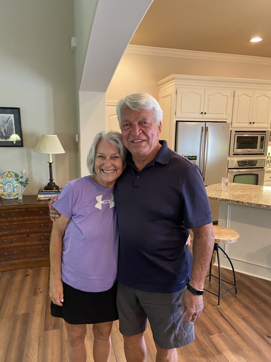 Ken Brust with his wife Tory - the couple met in Midwest City.