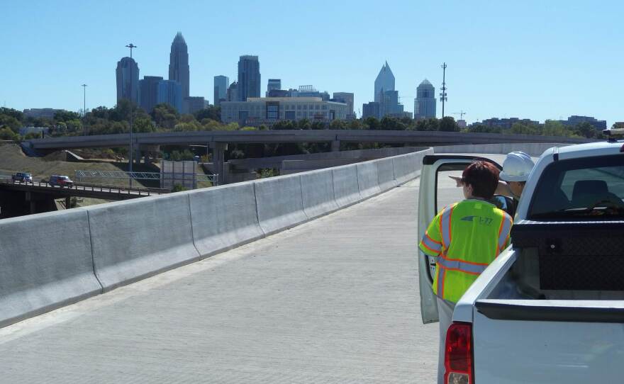 The Charlotte skyline is visible from the toll-lane ramp from I-77 onto I-277 near uptown. 