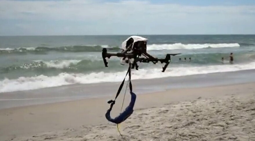 A screengrab of a video showing the Wrightsville Beach Fire Department use a drone for a simulated beach rescue.