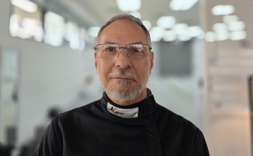 Robert Szokolay is the founder of and head coach at the Orlando Fencing Sports Center.