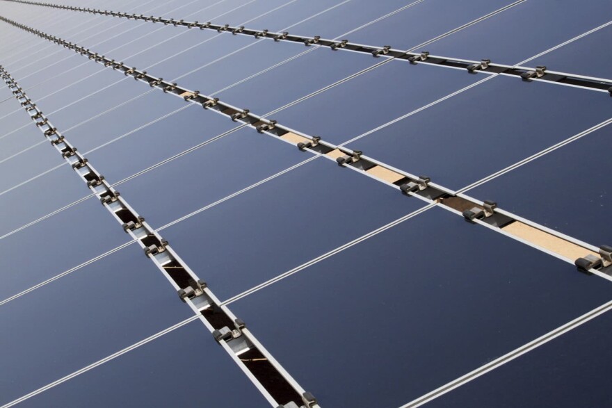 FILE- This April 20, 2011, file photo shows some of the 30,000 solar panels that make up the Public Service Company of New Mexico's new 2-megawatt photovoltaic array in Albuquerque, N.M. Some in the U.S. solar-power industry are hoping a decision this week by President Donald Trump doesnt bring on an eclipse. Companies that install solar-power systems for homeowners and utilities are bracing for Trumps call on whether to slap tariffs on imported panels. The solar business in the U.S. has boomed in recent years, driven by falling prices for panels, thanks in part to cheap imports. That has made solar power more competitive with electricity generated from coal and natural gas.  (AP Photo/Susan Montoya Bryan,File)