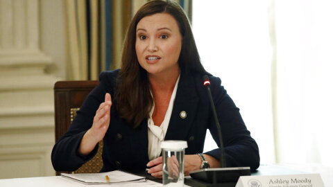 Florida Attorney General Ashley Moody speaks during a roundtable discussion at the White House in Washington in June 2021. On Wednesday, July 21, 2021, Moody tweeted that she has tested positive for COVID-19. Moody said she had been vaccinated for the virus earlier in the year.