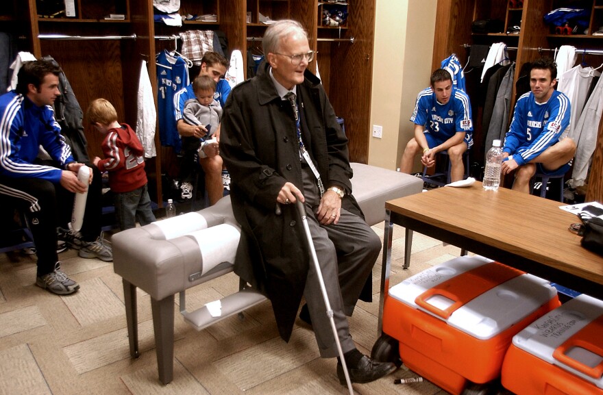 Lamar Hunt in the locker room with the Kansas City Wizards.