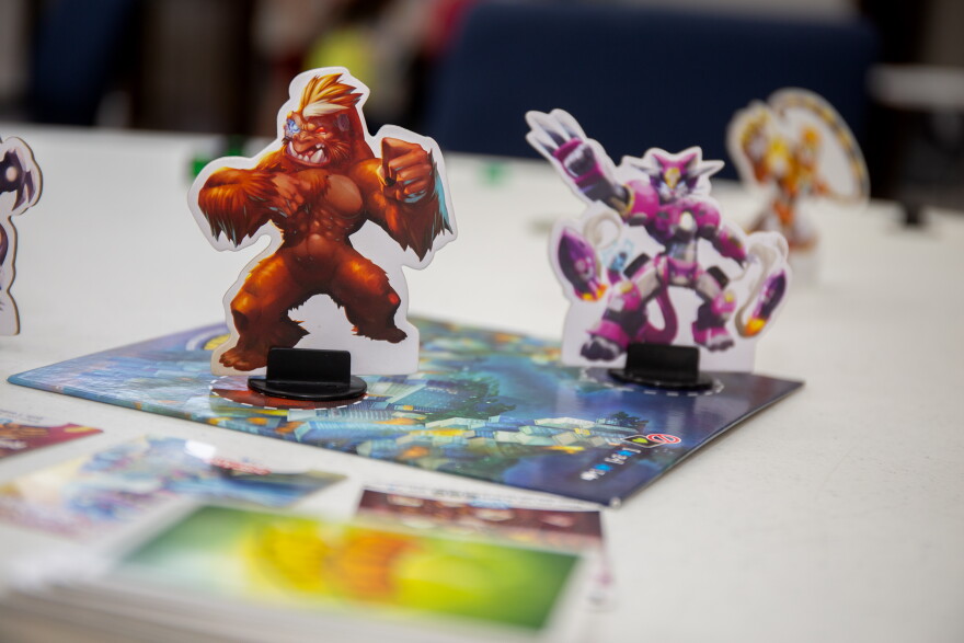 Close ups of two monsters in the King of Toyko game.