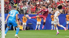 Portugal's Cristiano Ronaldo (7) shoots against Spain goalkeeper Unai Simon (23) during the World Cup round of 16 soccer match in Arlington, Texas, near Dallas, Monday, July 6, 2026.