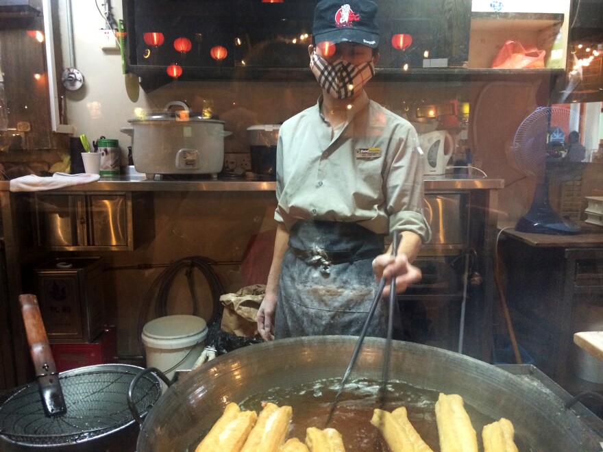 A food vendor at Hawker Center, Airport Road, Singapore