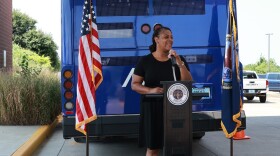 Evansville Mayor Stephanie Terry (D) announces the Patriot Pass program in front of a METS bus, July 27, 2026