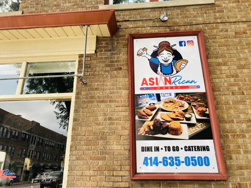 A storefront shows a sign reading "Asian Rican" 