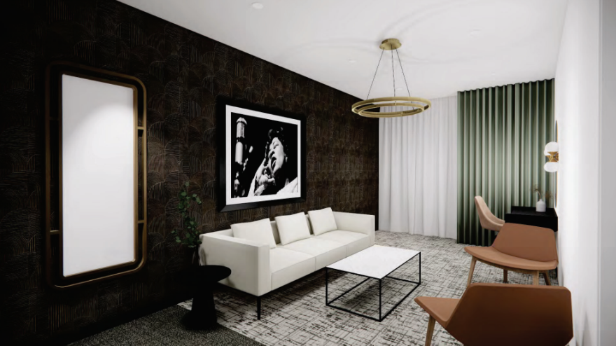 A room with a black accent wall, white and green curtains, a white couch, a black desk, three brown chairs and a white coffee table.