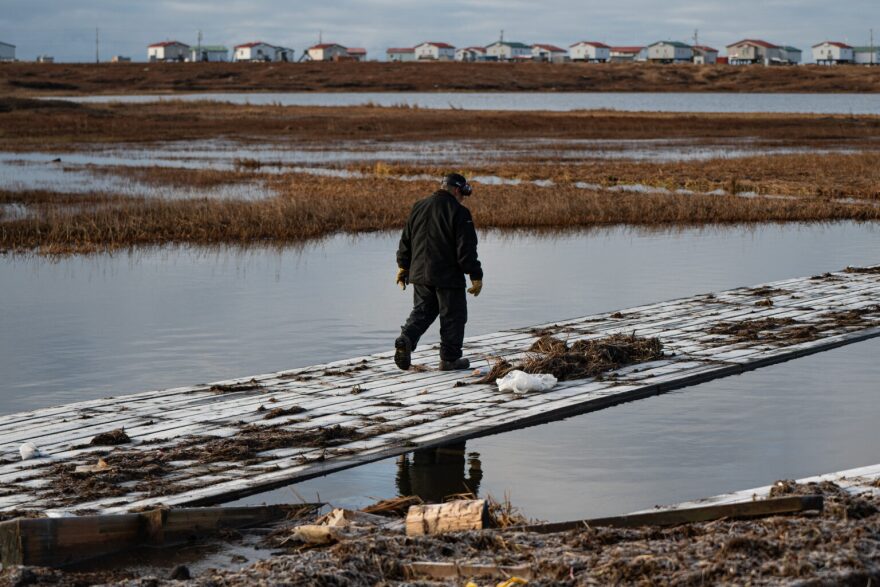 Eric Phillip, the boardwalk foreman for the Kuskokwim Delta coastal community of Kongiganak, surveys infrastructure damage caused by Typhoon Halong, Oct. 18, 2025.