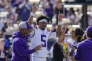 LSU quarterback Jayden Daniels celebrates 