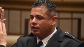 Eric Echevarria is sworn in as Peoria's next police chief during a brief ceremony at Peoria City Hall on July 30, 2021.