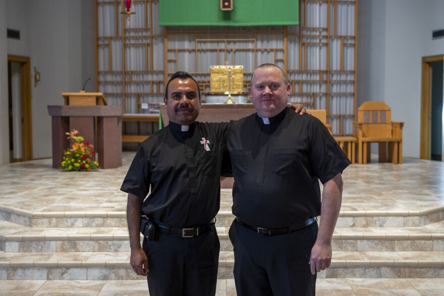 St. Mary’s Catholic Church has many parishioners from the immigrant community. Father Brent Lingle (right) and Deacon Hector Mora, who used to work in the Tyson turkey plant, comforted many meatpacking workers during the outbreaks.