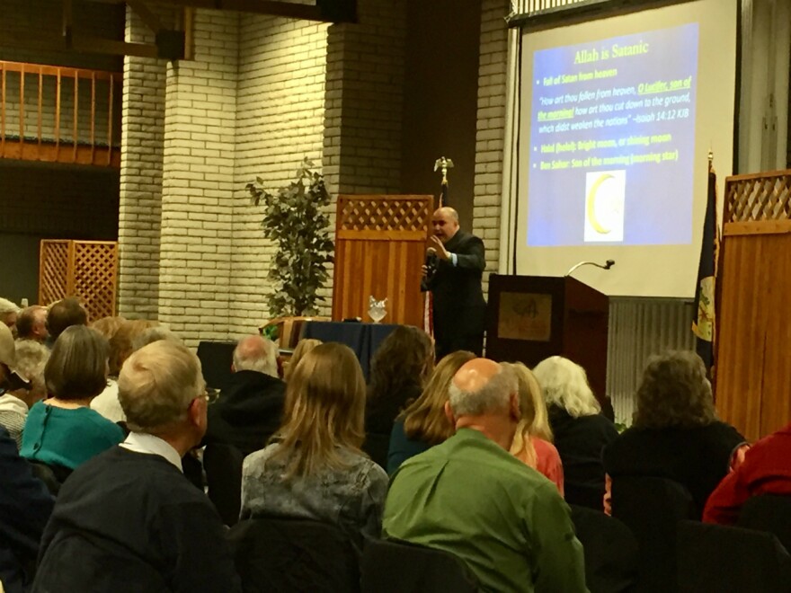 Pastor Shahram Hadian addresses a packed house at an event in Kalispell hosted by ACT for America's Flathead County Chapter