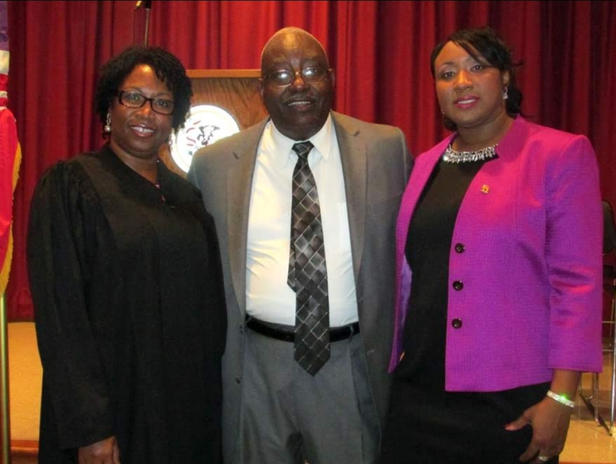 Judge Gwyn Gulley administers the oath of office to Litesa Wallace, with her predecessor Chuck Jefferson. Gulley was the first African American woman elected in Winnebago and Boone Counties. Jefferson helped create judicial sub districts which increased the diversity of the state's judicial system.