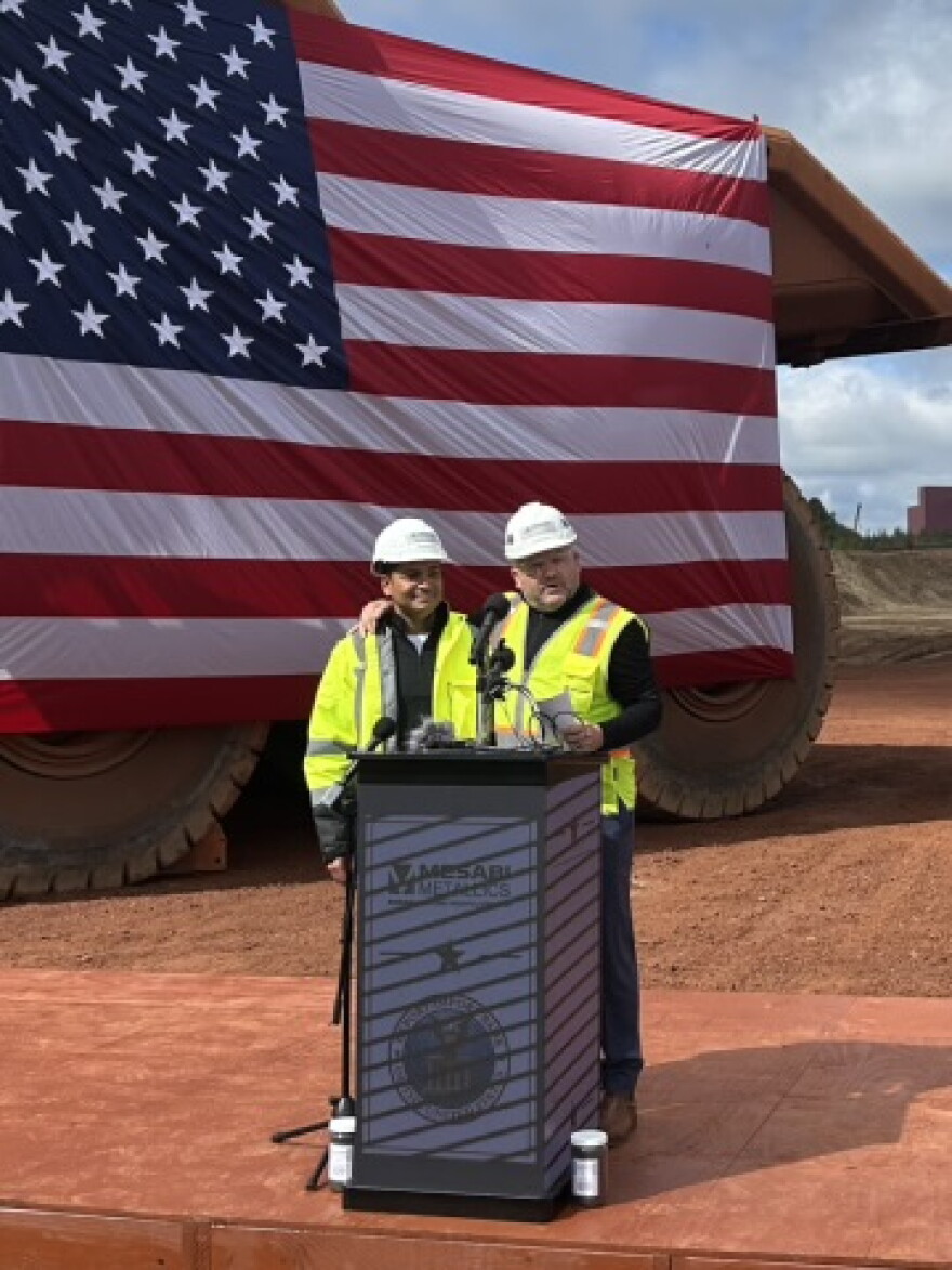 Rewant Ruia of Essar Group and Joe Broking of Mesabi Metallics wrap up speaking remarks at a blast event near Nashwauk on Sept. 17, 2026.