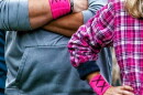 Protesters wear pink armbands on the sidelines of the Bow girls soccer game on Tuesday, September 24, 2024.