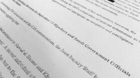 A section of one of the 28 pages from the once-top secret congressional report into 9/11 that questioned whether Saudis who were in contact with the hijackers after they arrived in the U.S. knew what they were planning. Parts of it are still redacted.
