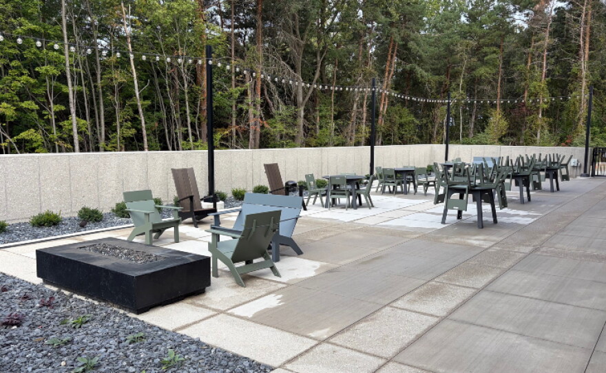 Amenities include three basketball courts, a one-mile indoor walking track, snack bar, fitness center, multi-sport simulator, playground, rentable event space, and child watch center.
