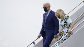 President Biden and First Lady Jill Biden arrive at Lawson Army Airfield in Georgia on Thursday. Biden met with former President Jimmy Carter ahead of a drive-in rally near Atlanta.