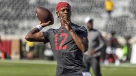 Alabama quarterback Keelon Russell (12) warms up before an NCAA college football game against Wisconsin, Saturday, Sept. 13, 2025, in Tuscaloosa, Ala. (AP Photo/Vasha Hunt)