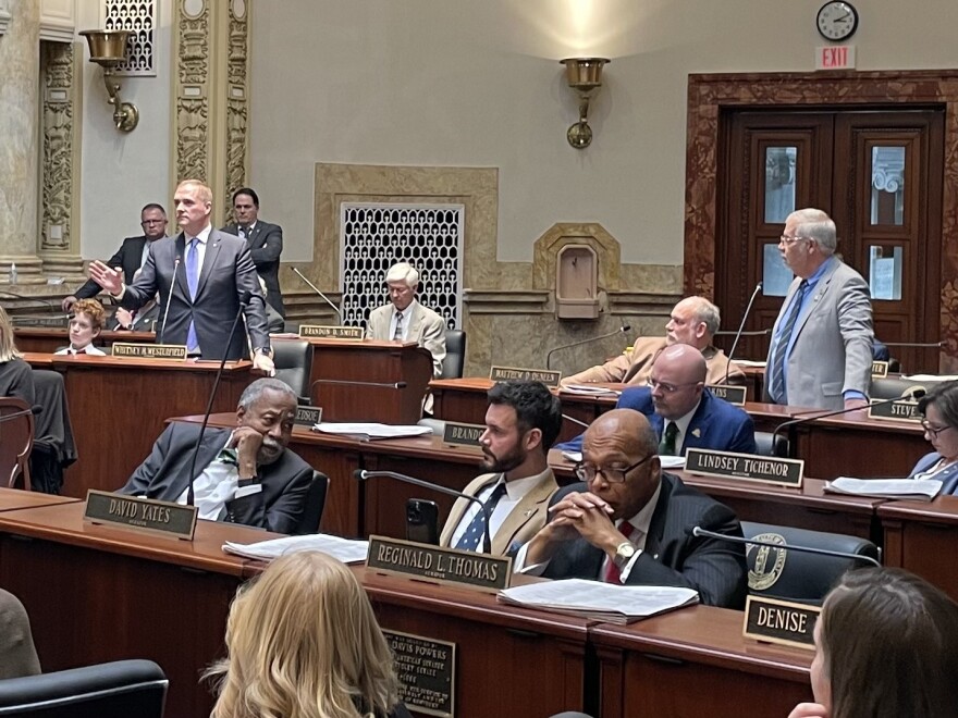 Standing left to right-Western Kentucky Senator Whitney Westerfield and Clark County Senator Greg Elkins