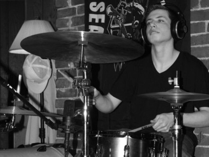 Max at his drum kit. Playing the drums was Max's passion, his family says, as was "creating original music, listening to jazz, rock, and blues, shooting pool, following the Red Sox and Patriots, playing fantasy football with his family, and enjoying card games and chess."