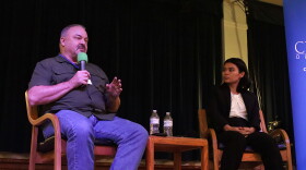 Ward 5 Incumbent Mike Clark (left) speaks while challenger Athena Aguiar (right) looks on during a September 18, 2026 City Club of Eugene forum.