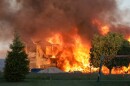 A house on fire after an apparently explosion in Washington on Sunday, May 10, 2026.