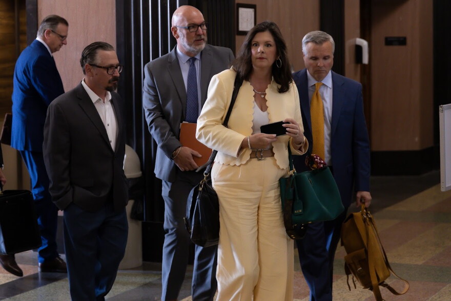 David Chaney (left) and Ben Harris (right) walk to the courtroom with their attorneys at the Oklahoma County Courthouse on Thursday, April 30, 2026.