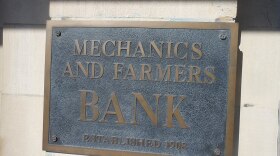 Sign reading "Mechanics and Farmers Bank Established 1908."