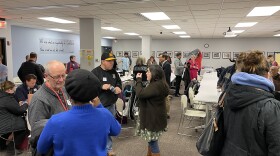 Bloomington-Normal residents discuss housing needs at the McLean County Health Department Building.