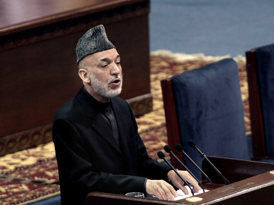 Karzai told the gathering he supports a security deal with the U.S., but he didn't hide his troubled relationship with the Americans. "They don't trust me, and I don't trust them," he said.