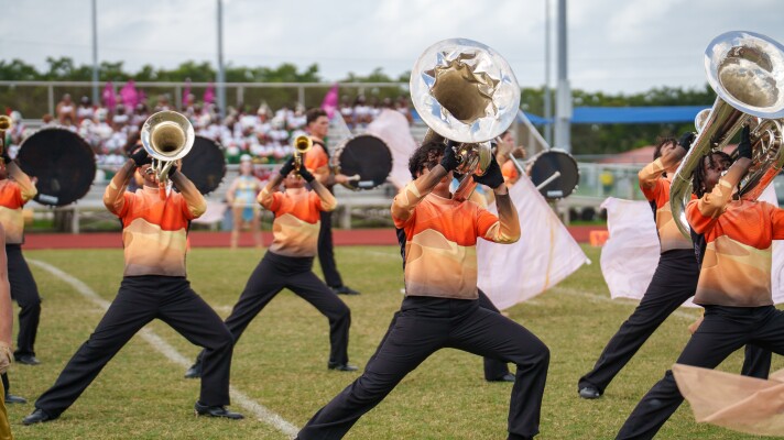Students from Charles W. Flanagan High School's marching band, The Falcon Sound, perform in 2025.