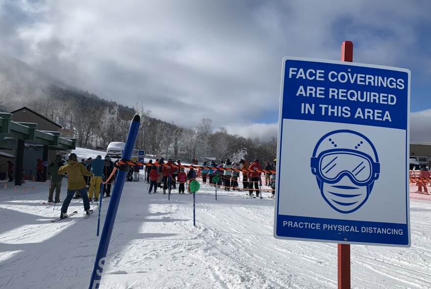 In the lift lines waiting to get on a chair to head up the mountain, skiers and boarders are reminded to wear masks by signs and attendants with little bullhorns. The lines are also more spread out with every other row empty. These are called 'ghost lines' to create more social distancing.